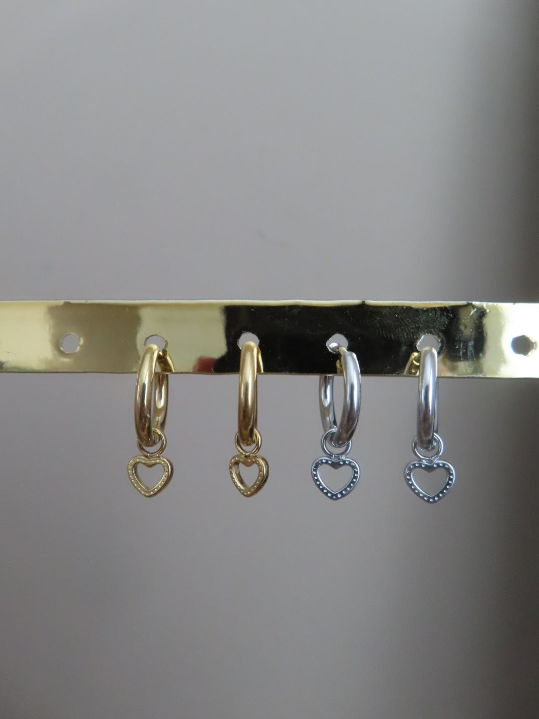 Minimalistische oorbellen met open hartje