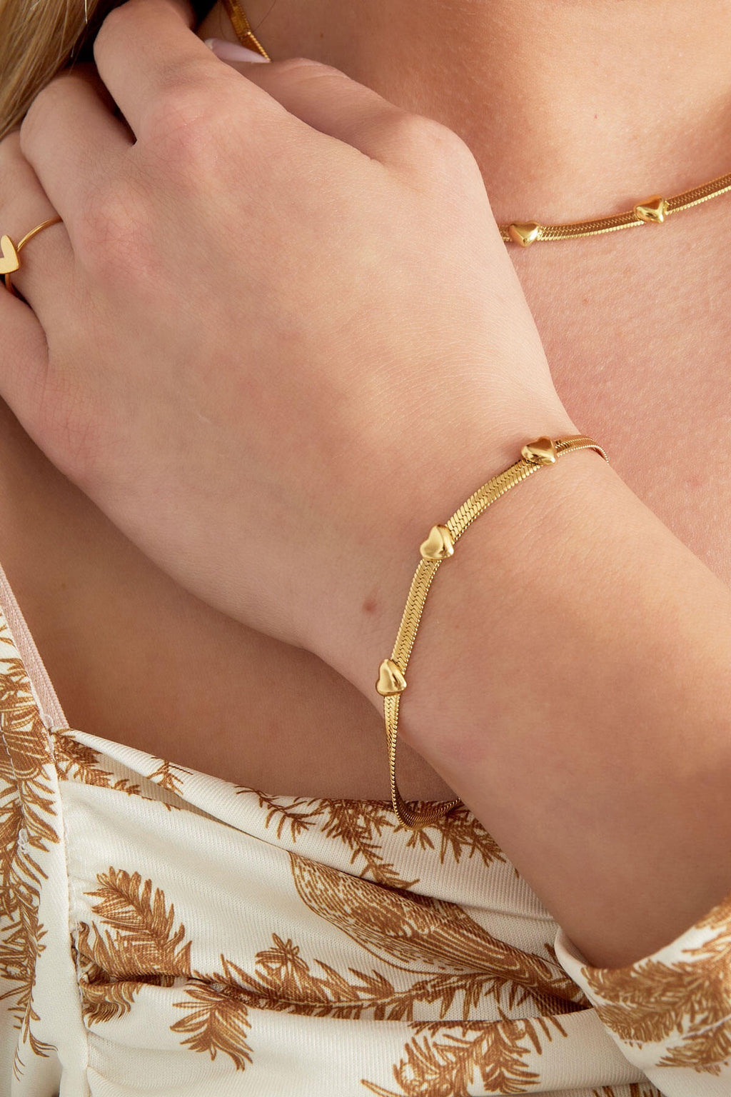 Platte armband met hartjes